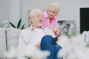 Senior reviewing Medicare plan options on a tablet, illustrating effective email marketing for Medicare leads