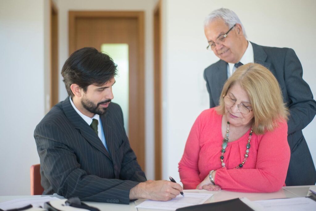 Medicare agent explaining T65 and AEP lead strategies to agency owner, representing the comparison of T65 leads AEP leads