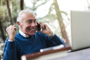Professional agent confidently speaking on the phone, illustrating a successful calling Medicare leads script